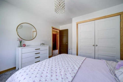 75 Ironstone Drive, Coleman, AB - Indoor Photo Showing Bedroom