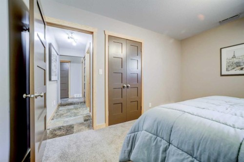 75 Ironstone Drive, Coleman, AB - Indoor Photo Showing Bedroom
