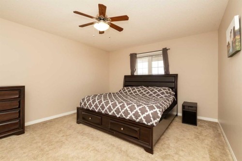910 Centennial Avenue, Nobleford, AB - Indoor Photo Showing Bedroom