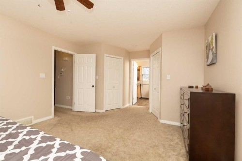 910 Centennial Avenue, Nobleford, AB - Indoor Photo Showing Bedroom