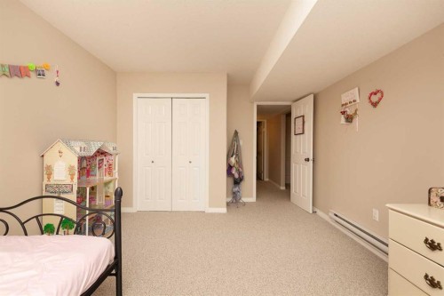 910 Centennial Avenue, Nobleford, AB - Indoor Photo Showing Bedroom