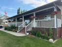 910 Centennial Avenue, Nobleford, AB  - Outdoor With Deck Patio Veranda 