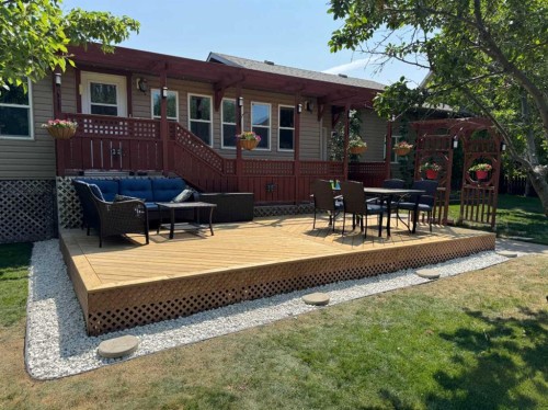 910 Centennial Avenue, Nobleford, AB - Outdoor With Deck Patio Veranda
