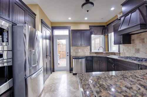226 Riverstone Boulevard West, Lethbridge, AB - Indoor Photo Showing Kitchen With Upgraded Kitchen