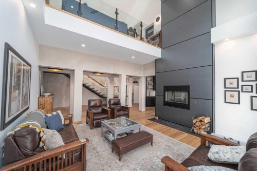 8938 24 Avenue, Coleman, AB - Indoor Photo Showing Living Room With Fireplace