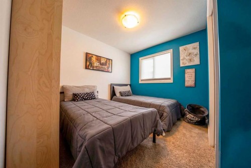 4709 7 Street, Coalhurst, AB - Indoor Photo Showing Bedroom