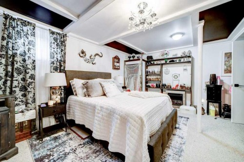 379N 300 E, Raymond, AB - Indoor Photo Showing Bedroom