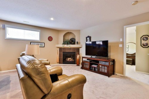 91 Fairmont Point South, Lethbridge, AB - Indoor With Fireplace