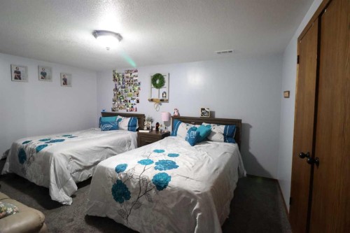 4726 57 Ave, Taber, AB - Indoor Photo Showing Bedroom