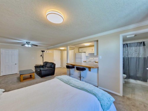 9-1739 St Edwards Boulevard North, Lethbridge, AB - Indoor Photo Showing Bedroom