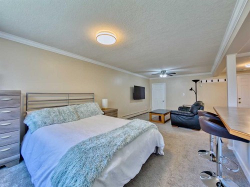 9-1739 St Edwards Boulevard North, Lethbridge, AB - Indoor Photo Showing Bedroom