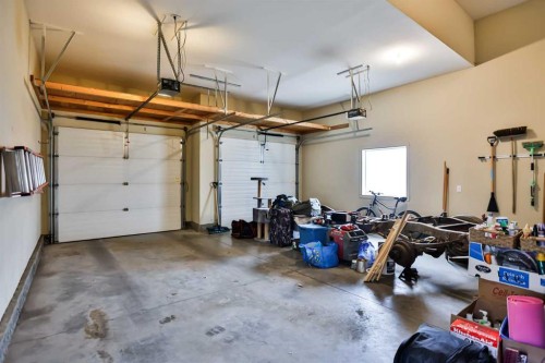4 Rivermill Landing West, Lethbridge, AB - Indoor Photo Showing Garage