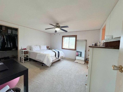 On 252 Range, Rural Cardston County, AB - Indoor Photo Showing Bedroom