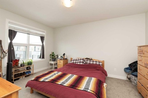3-67 Aquitania Circle West, Lethbridge, AB - Indoor Photo Showing Bedroom