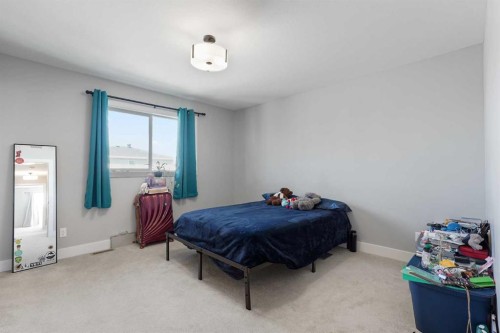 2 Miners Road West, Lethbridge, AB - Indoor Photo Showing Bedroom