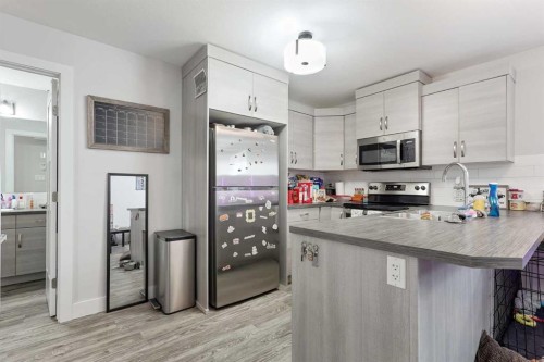 2 Miners Road West, Lethbridge, AB - Indoor Photo Showing Kitchen With Stainless Steel Kitchen