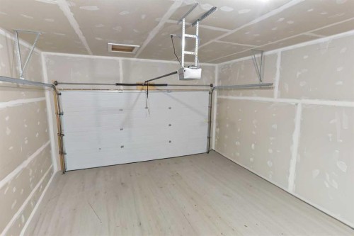 2 Miners Road West, Lethbridge, AB - Indoor Photo Showing Garage