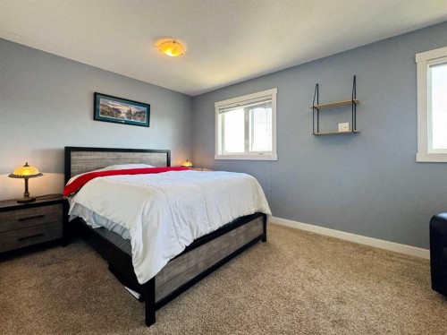 86 Riverstone Boulevard West, Lethbridge, AB - Indoor Photo Showing Bedroom