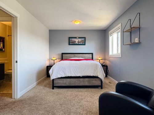 86 Riverstone Boulevard West, Lethbridge, AB - Indoor Photo Showing Bedroom