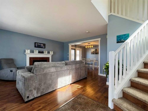 86 Riverstone Boulevard West, Lethbridge, AB - Indoor With Fireplace