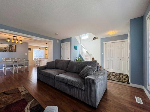 86 Riverstone Boulevard West, Lethbridge, AB - Indoor Photo Showing Living Room