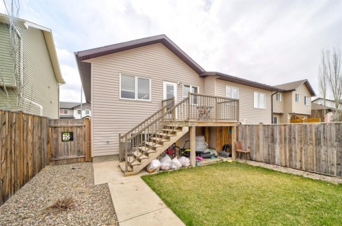 821 Silkstone Close West, Lethbridge, AB - Outdoor With Deck Patio Veranda With Exterior