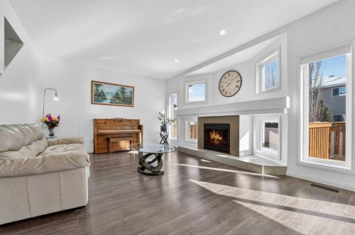 678 Twinriver Crescent West, Lethbridge, AB - Indoor Photo Showing Living Room With Fireplace