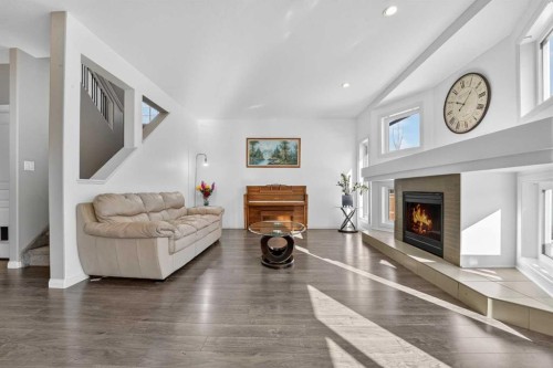678 Twinriver Crescent West, Lethbridge, AB - Indoor Photo Showing Living Room With Fireplace