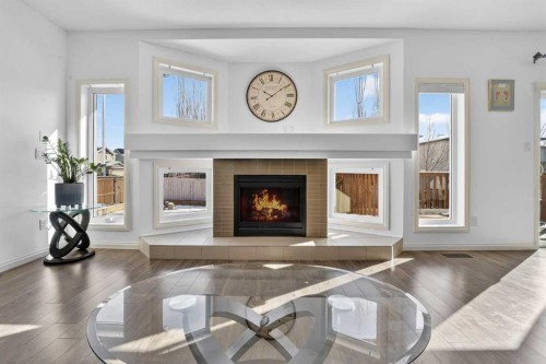 678 Twinriver Crescent West, Lethbridge, AB - Indoor Photo Showing Living Room With Fireplace