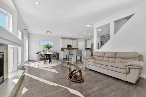 678 Twinriver Crescent West, Lethbridge, AB - Indoor Photo Showing Living Room With Fireplace