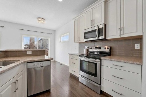 678 Twinriver Crescent West, Lethbridge, AB - Indoor Photo Showing Kitchen With Stainless Steel Kitchen