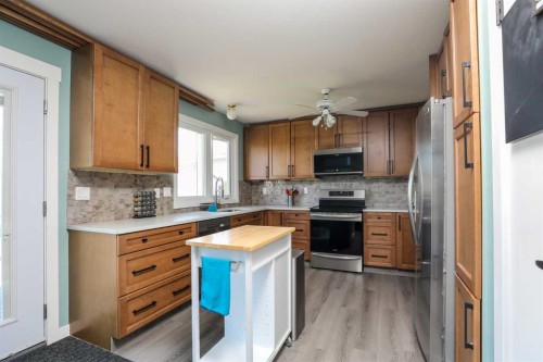 97 Laval Court West, Lethbridge, AB - Indoor Photo Showing Kitchen
