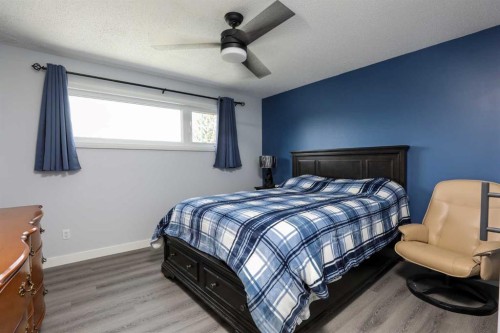 97 Laval Court West, Lethbridge, AB - Indoor Photo Showing Bedroom