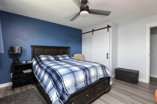 97 Laval Court West, Lethbridge, AB - Indoor Photo Showing Bedroom