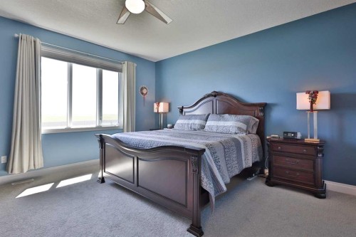 397 S 250 W, Raymond, AB - Indoor Photo Showing Bedroom