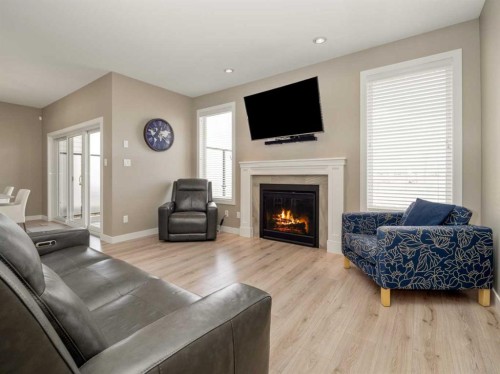 413 Devonia Way West, Lethbridge, AB - Indoor Photo Showing Living Room With Fireplace