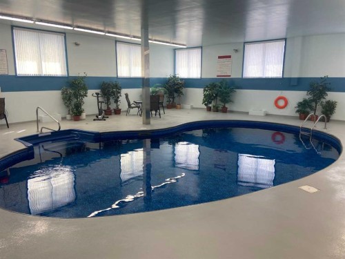 110-65 Temple Blvd W, Lethbridge, AB - Indoor Photo Showing Other Room With In Ground Pool
