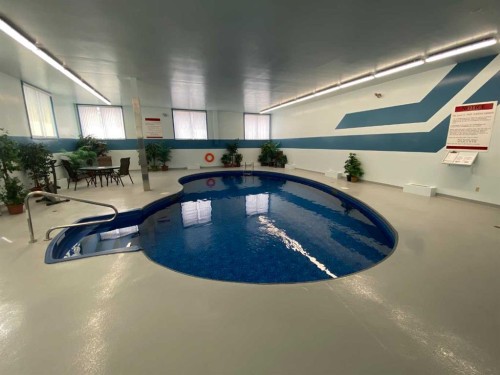 110-65 Temple Blvd W, Lethbridge, AB - Indoor Photo Showing Other Room With In Ground Pool
