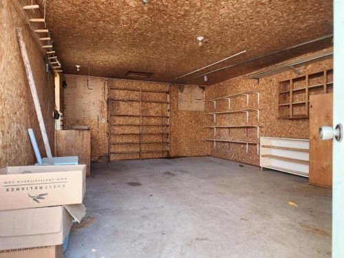 234 49 Ave E, Claresholm, AB - Indoor Photo Showing Garage