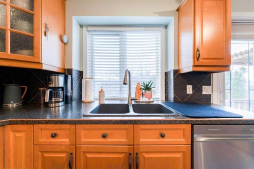 4214 56 Street, Taber, AB - Indoor Photo Showing Kitchen With Double Sink