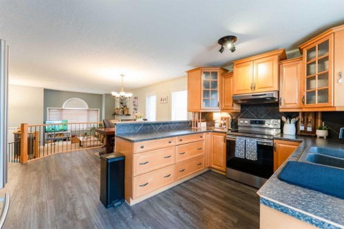 4214 56 Street, Taber, AB - Indoor Photo Showing Kitchen With Double Sink