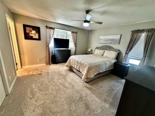 94050 Range Rd 214A, Rural Lethbridge County, AB - Indoor Photo Showing Bedroom
