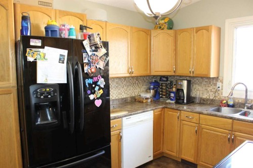 2811 13 Avenue South, Lethbridge, AB - Indoor Photo Showing Kitchen With Double Sink