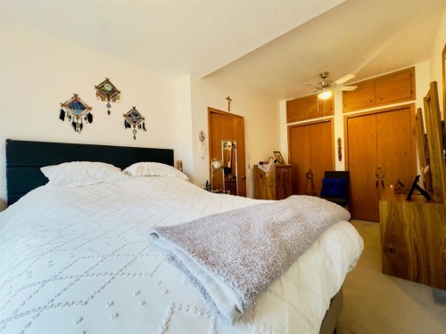 7710 24 Avenue, Coleman, AB - Indoor Photo Showing Bedroom