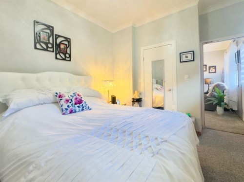 7710 24 Avenue, Coleman, AB - Indoor Photo Showing Bedroom