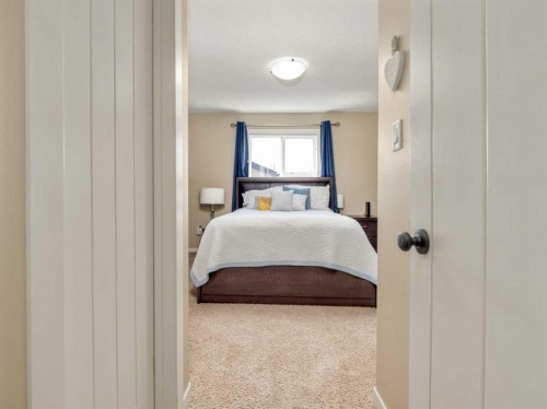 553 Mary Cameron Crescent North, Lethbridge, AB - Indoor Photo Showing Bedroom