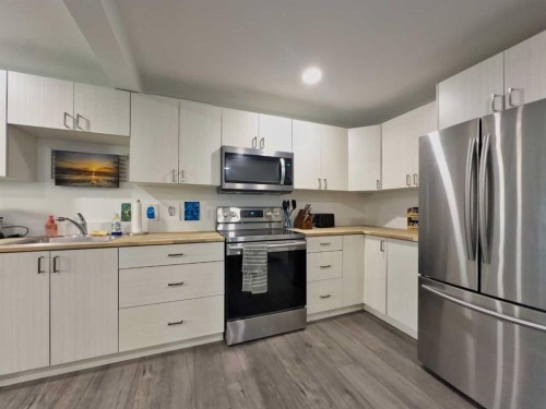 8149 26 Avenue, Coleman, AB - Indoor Photo Showing Kitchen With Double Sink