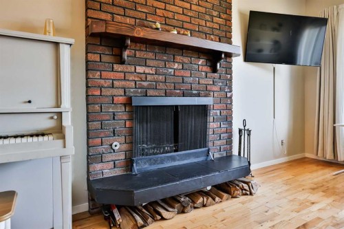 99 Lemoyne Crescent West, Lethbridge, AB - Indoor With Fireplace