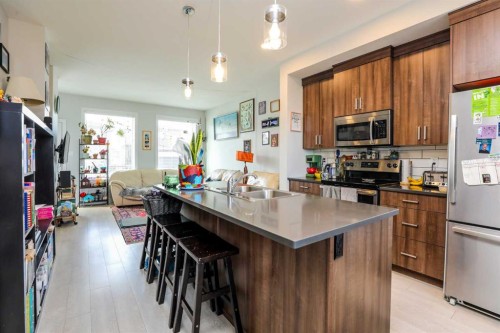 867 Coalbrook Close West, Lethbridge, AB - Indoor Photo Showing Kitchen With Double Sink