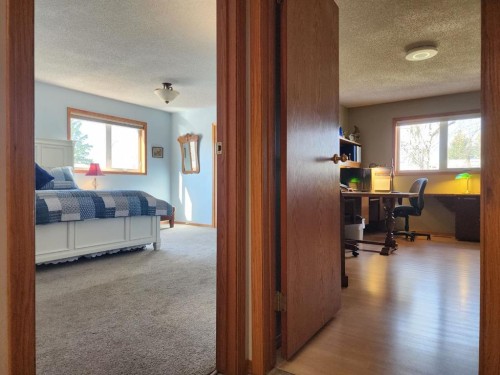 5307 2A St. East, Claresholm, AB - Indoor Photo Showing Bedroom